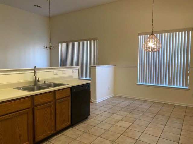 kitchen with light tile patterned flooring, sink, an inviting chandelier, hanging light fixtures, and black dishwasher