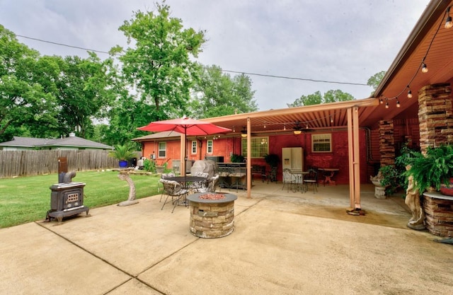 view of patio with a fire pit