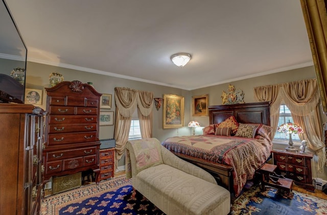 bedroom featuring crown molding