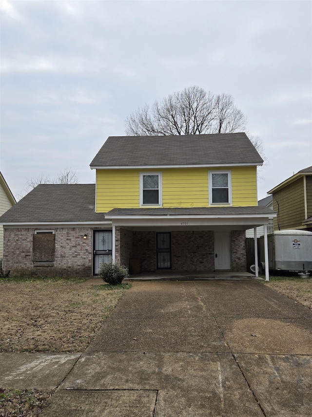 view of front property with a carport