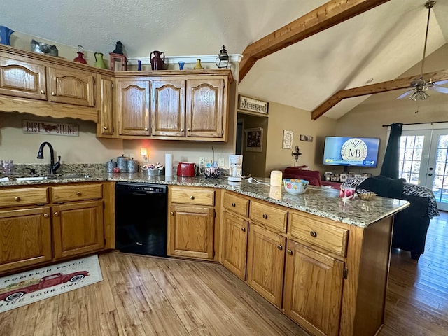 kitchen featuring sink, black dishwasher, light hardwood / wood-style floors, french doors, and kitchen peninsula