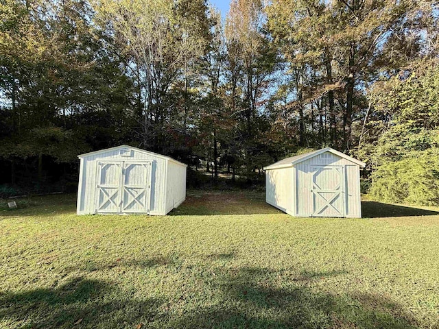 view of outbuilding featuring a yard