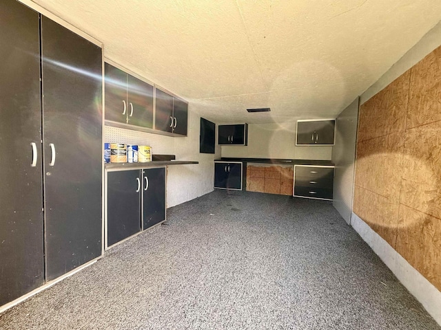 kitchen featuring a textured ceiling