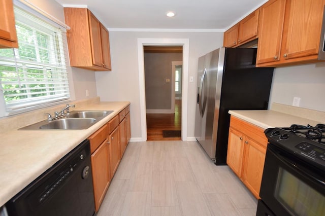 kitchen featuring sink and black appliances