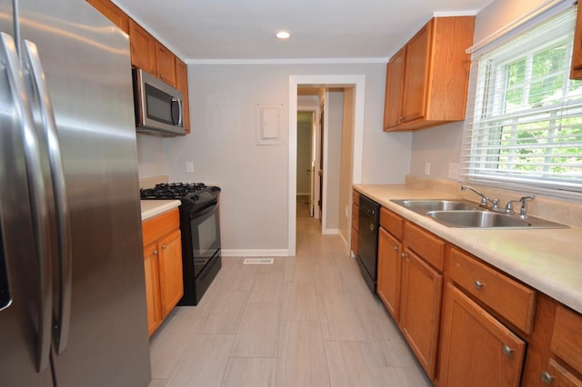 kitchen featuring sink and black appliances