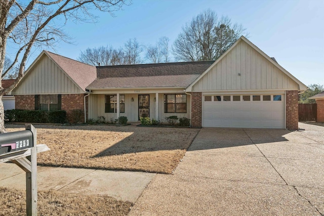 single story home featuring a garage