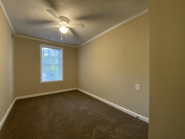 carpeted spare room with crown molding, a textured ceiling, and ceiling fan