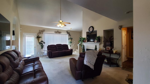 living room featuring high vaulted ceiling, light carpet, and ceiling fan