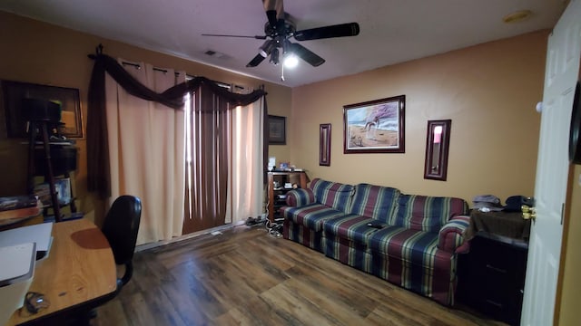 office space featuring wood-type flooring and ceiling fan