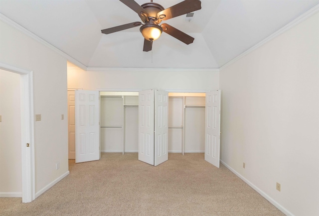 unfurnished bedroom featuring ceiling fan, ornamental molding, and vaulted ceiling