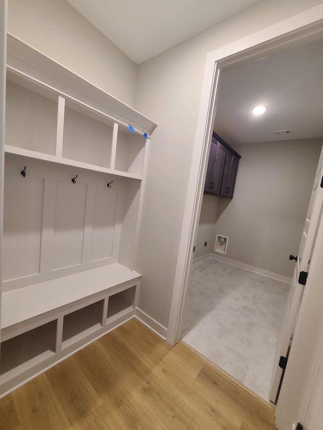 mudroom with hardwood / wood-style floors