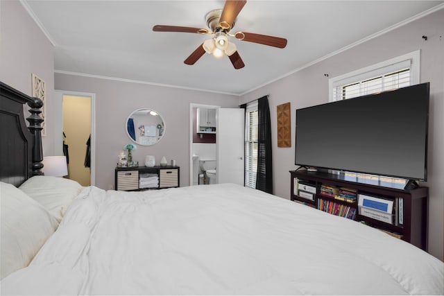 bedroom with crown molding, ceiling fan, and ensuite bathroom