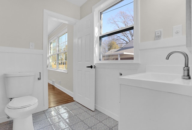 bathroom with sink and toilet