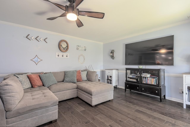 living room with crown molding, dark hardwood / wood-style floors, and ceiling fan