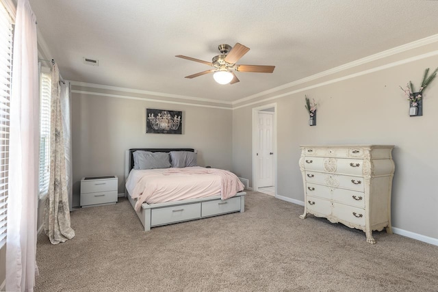 carpeted bedroom featuring multiple windows, crown molding, and ceiling fan