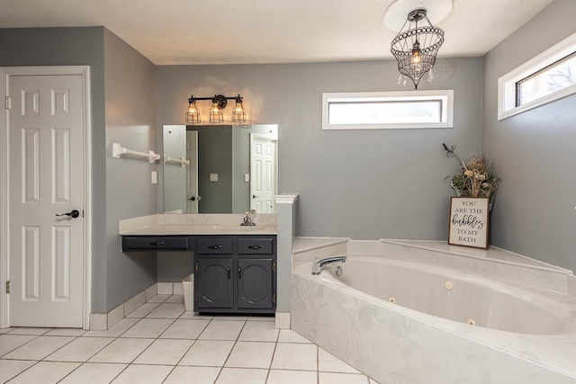 bathroom featuring vanity, a bath, and tile patterned flooring