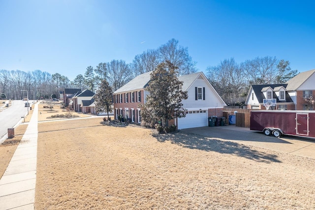 view of side of property featuring a garage