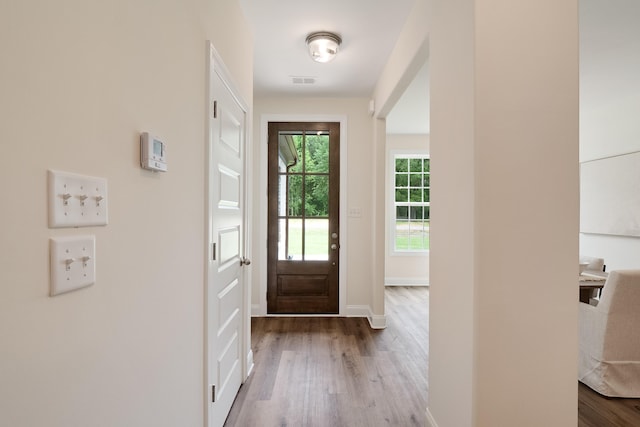 doorway featuring hardwood / wood-style flooring