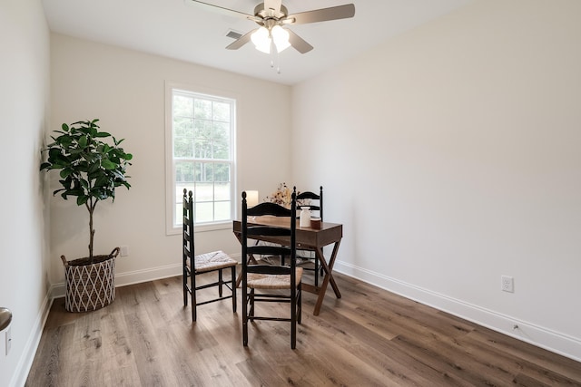 dining room featuring hardwood / wood-style floors and ceiling fan