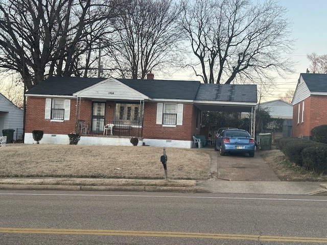 view of front of home with a carport and a porch