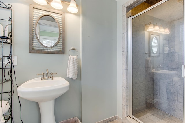 bathroom with sink and walk in shower