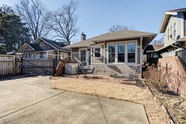 view of front of home with a patio area