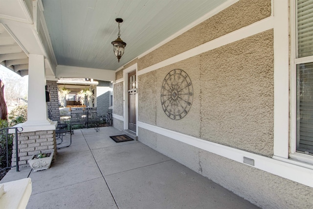 view of patio / terrace with a porch