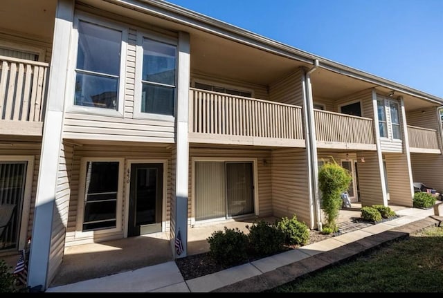 exterior space featuring a balcony