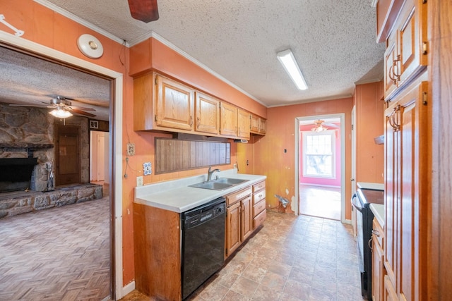 kitchen featuring sink, a fireplace, black appliances, ornamental molding, and a textured ceiling