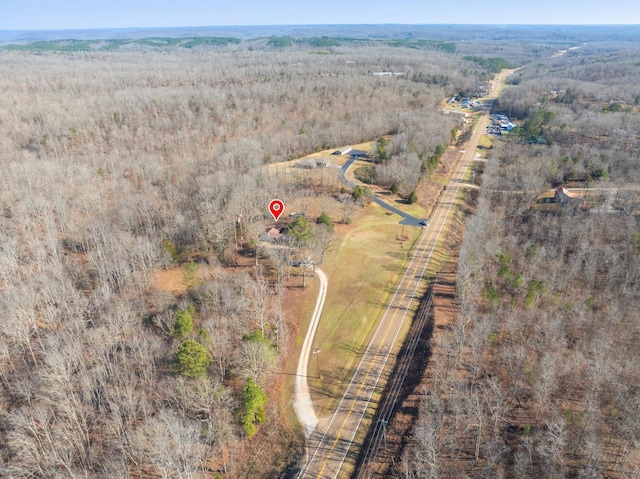 birds eye view of property with a rural view