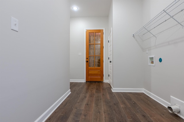 clothes washing area with washer hookup and dark hardwood / wood-style flooring