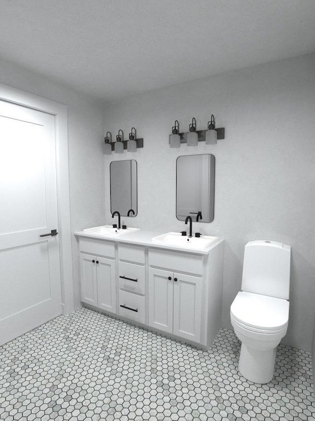 bathroom with vanity and toilet