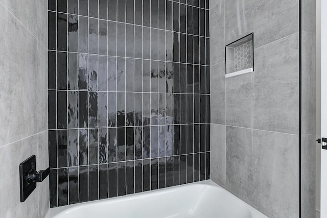 bathroom with shower / bath combination