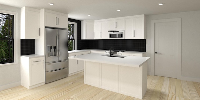 kitchen featuring a wealth of natural light, white cabinetry, an island with sink, decorative backsplash, and stainless steel refrigerator with ice dispenser