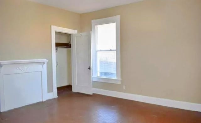 unfurnished bedroom featuring a closet