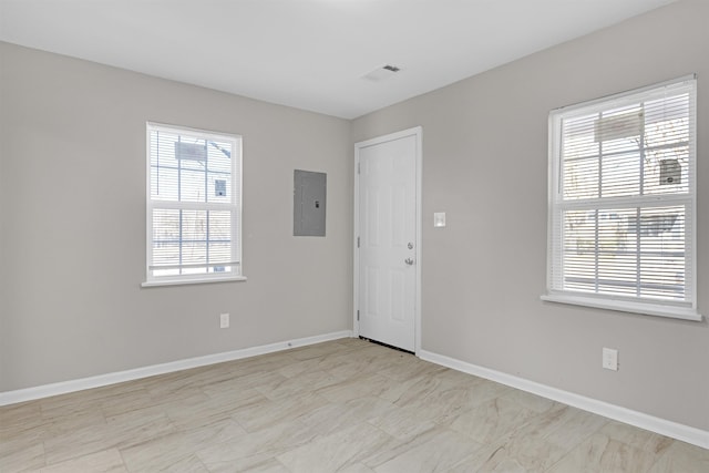 spare room featuring electric panel