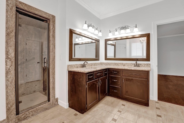 bathroom featuring tile patterned flooring, crown molding, vanity, and walk in shower