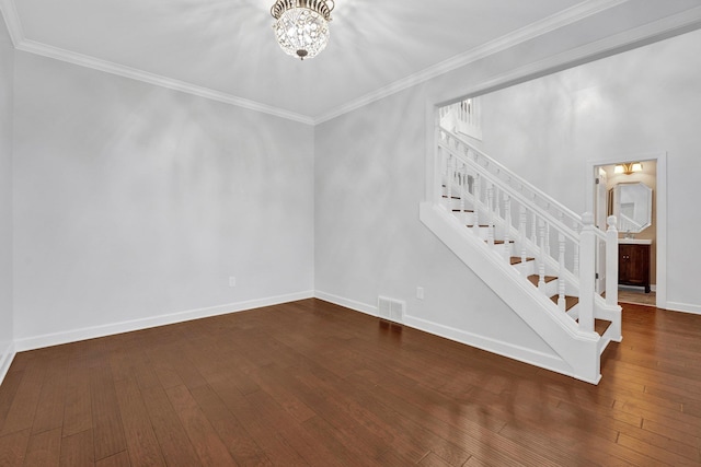 interior space with hardwood / wood-style flooring and crown molding