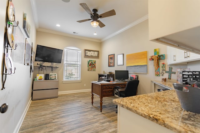 office with ornamental molding, ceiling fan, and light wood-type flooring