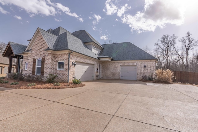 view of side of home with a garage