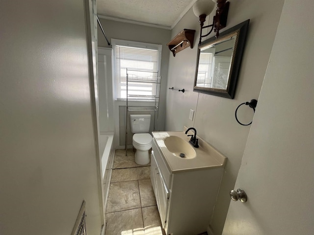 full bathroom featuring tile patterned floors, toilet, tub / shower combination, a textured ceiling, and vanity