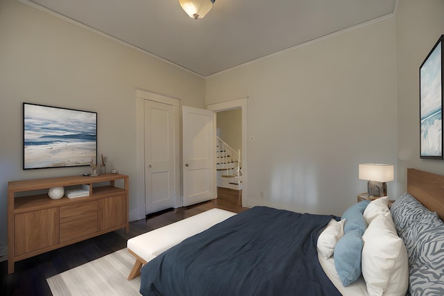 bedroom featuring dark wood-type flooring