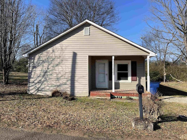 bungalow-style house featuring covered porch