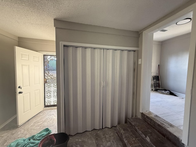 bathroom featuring a textured ceiling