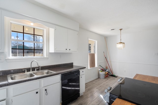 kitchen featuring white cabinetry, dishwasher, sink, stainless steel range with electric stovetop, and a textured ceiling