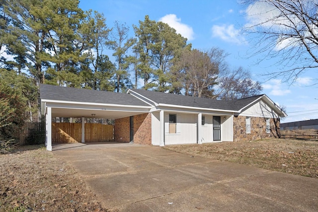 view of front facade with a carport