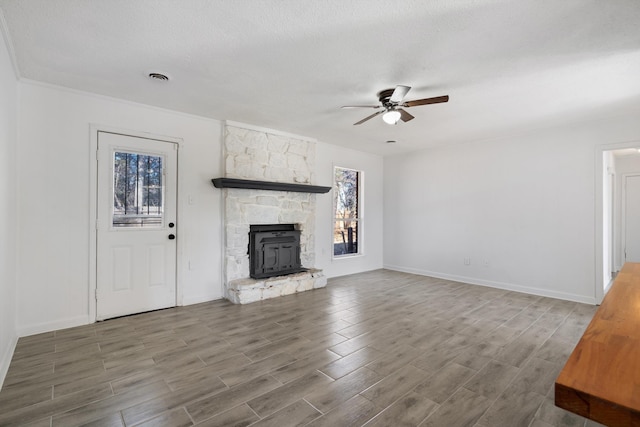 unfurnished living room featuring ceiling fan