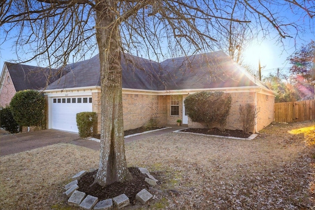 single story home with a garage