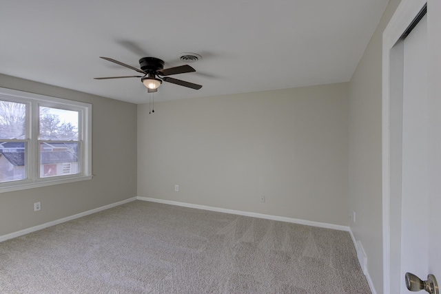 unfurnished room with carpet floors and ceiling fan