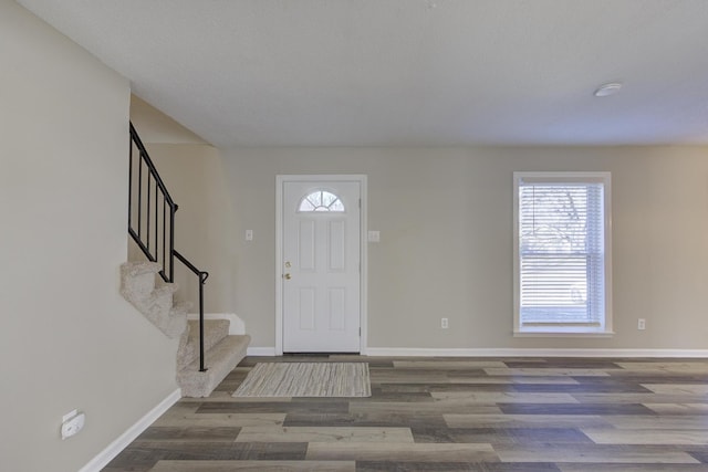 entrance foyer featuring wood-type flooring